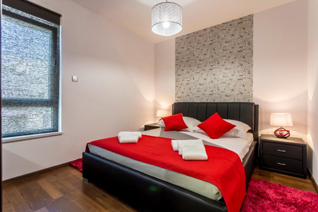 Posteľ alebo postele v izbe v ubytovaní Sea Pearl Luxury Apartment