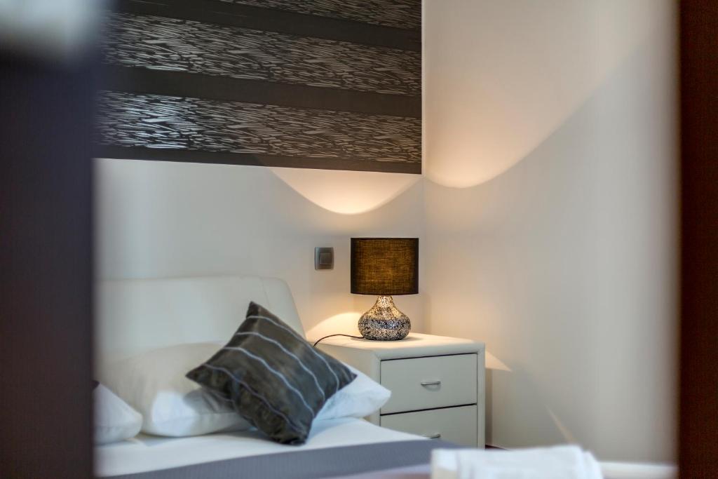 Posteľ alebo postele v izbe v ubytovaní Sea Pearl Luxury Apartment