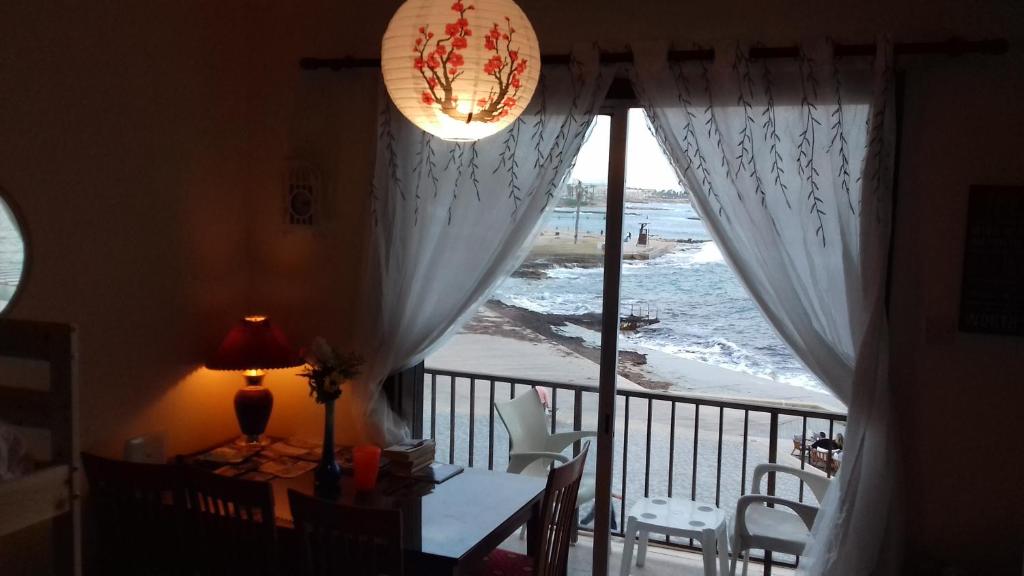 Postel nebo postele na pokoji v ubytování 777 Beach Guesthouse