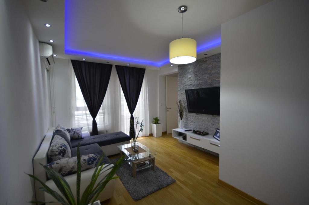 TV a/nebo společenská místnost v ubytování Clean&Cozy Apartments Novi Beograd