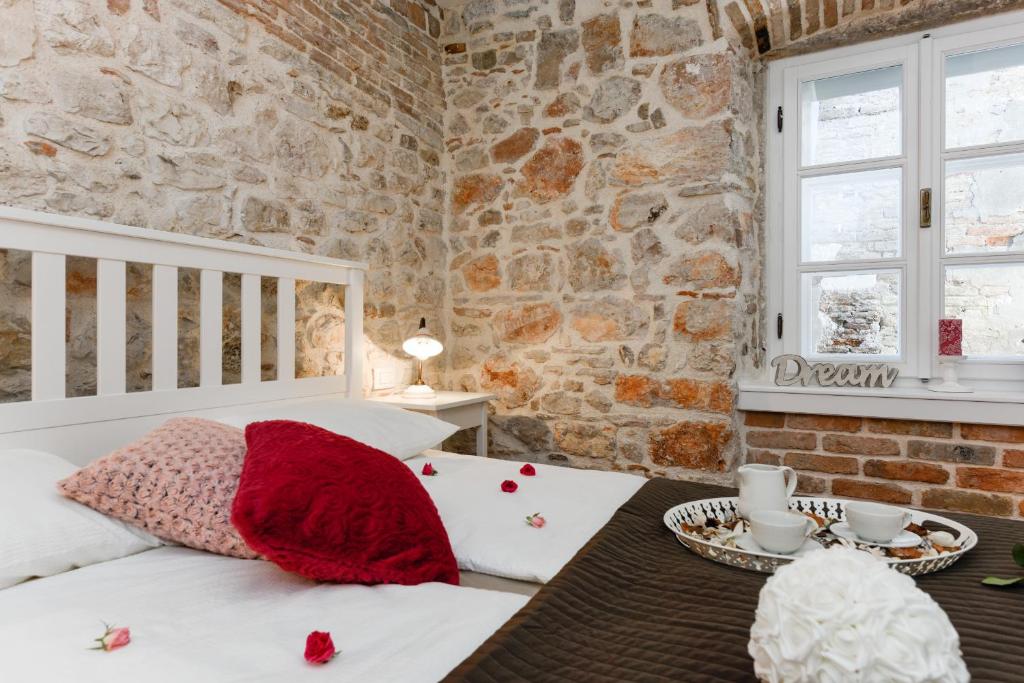 Posteľ alebo postele v izbe v ubytovaní Apartments Santa Lucia Exclusive