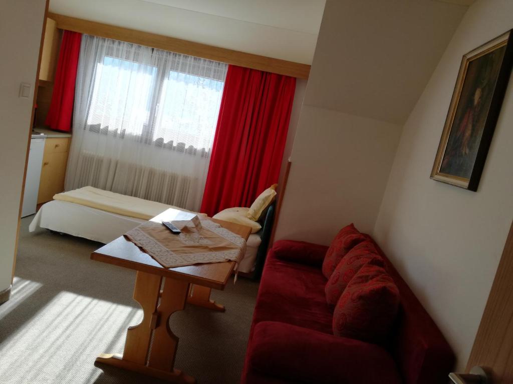 Posezení v ubytování Landgasthof Hubertusstubn