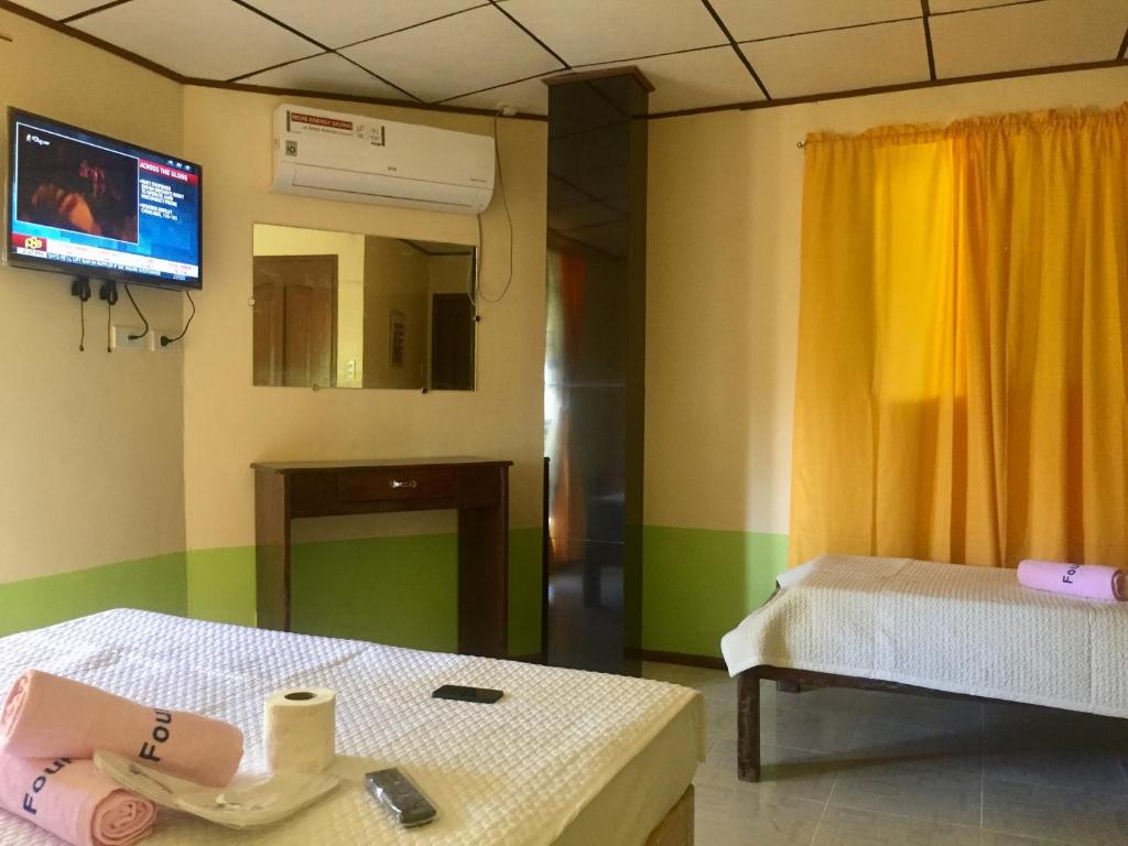 Postel nebo postele na pokoji v ubytování Hwan Dynasty Suite