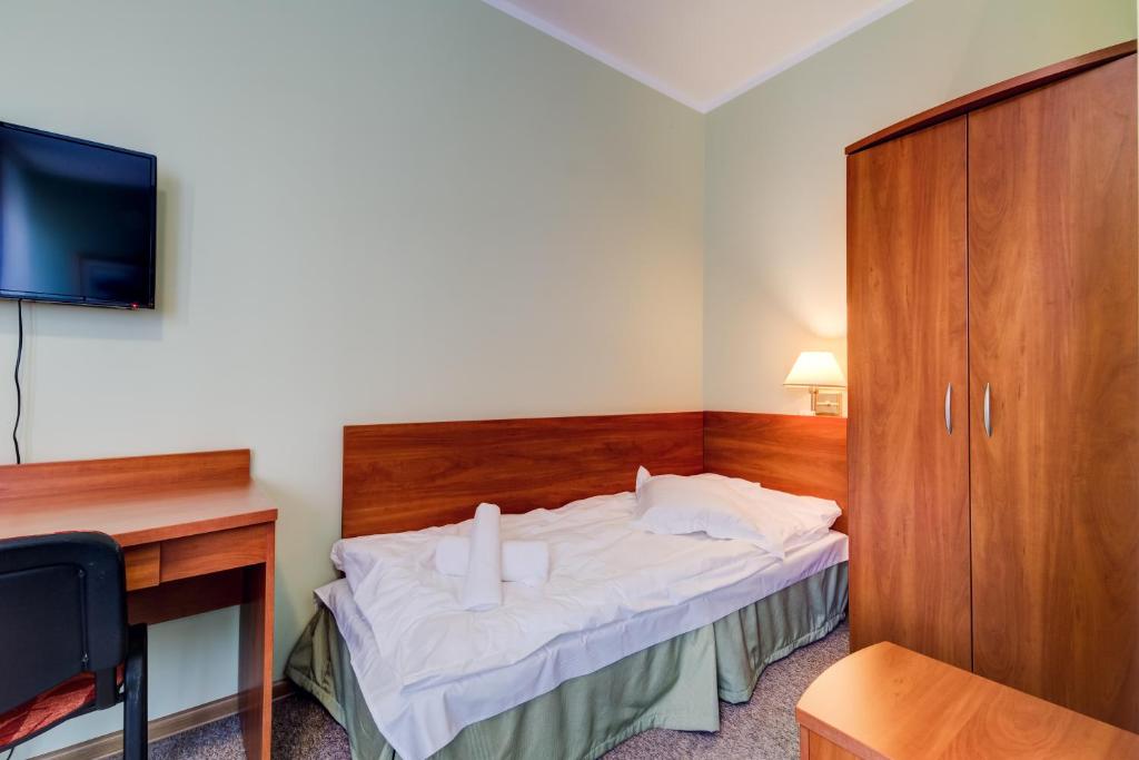 Posteľ alebo postele v izbe v ubytovaní Villa Plaza