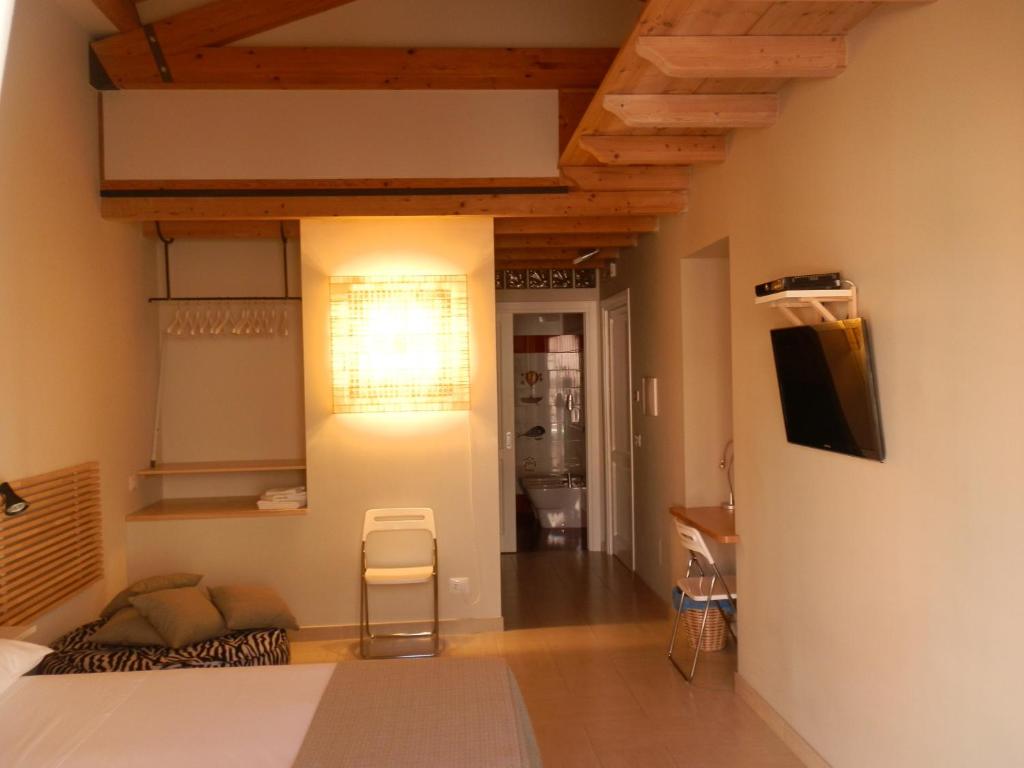 TV a/nebo společenská místnost v ubytování B&B Re Umberto