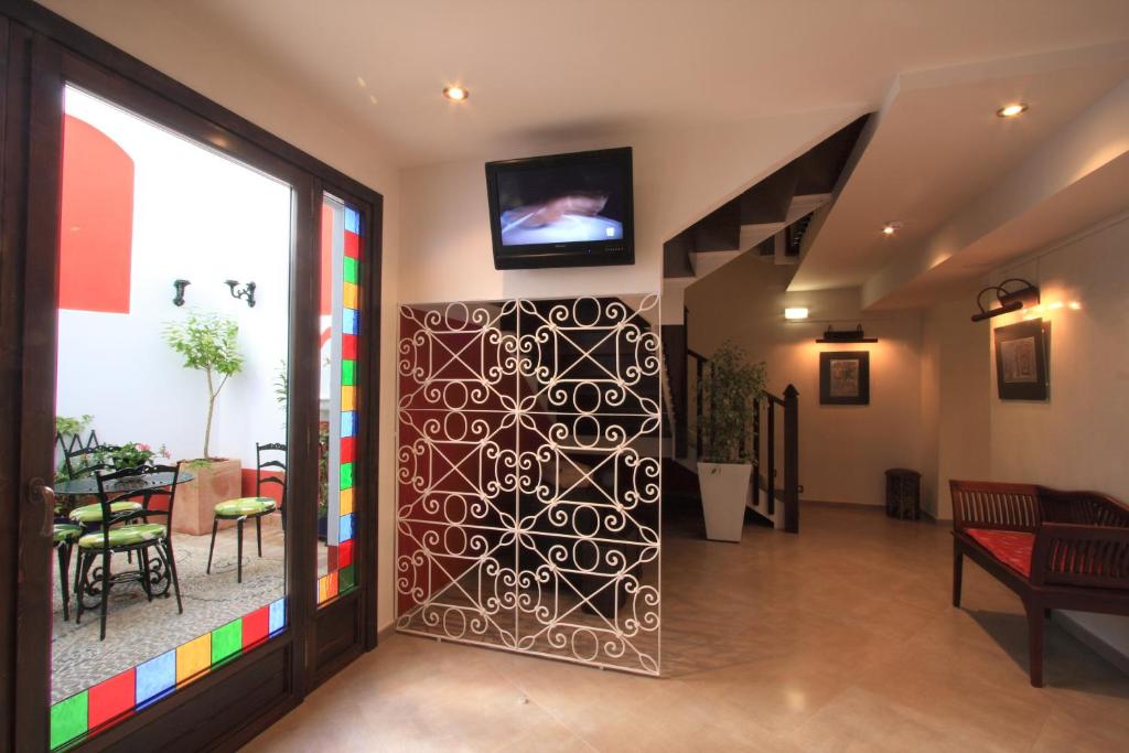 Een TV en/of entertainmentcenter bij Casa Baños de la Villa
