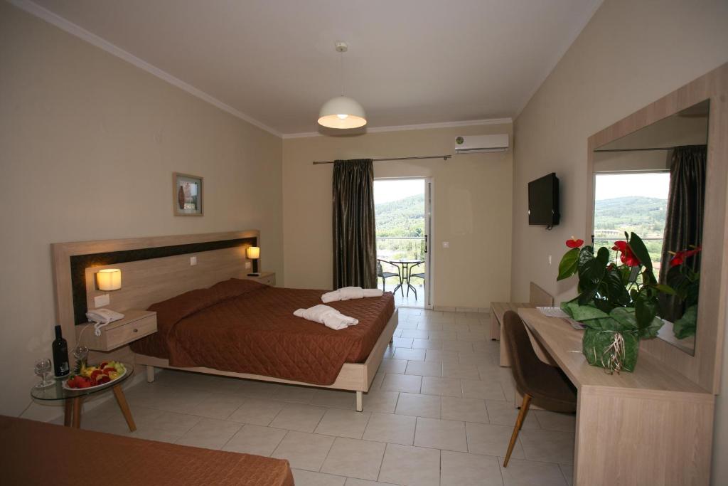A bed or beds in a room at Saint George Palace