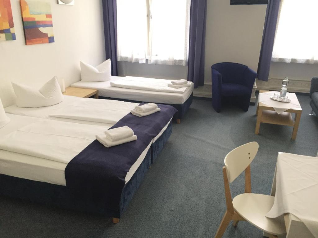 Postel nebo postele na pokoji v ubytování Hotel Seifert Berlin am Kurfürstendamm