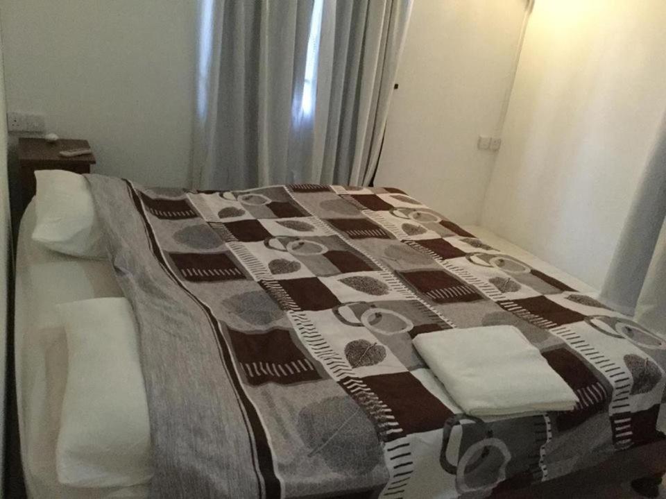 Postel nebo postele na pokoji v ubytování Skipper Dan Bungalow