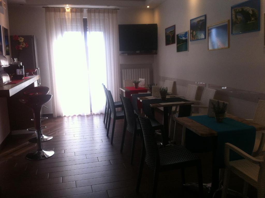 TV a/nebo společenská místnost v ubytování B&B Casa Camasso