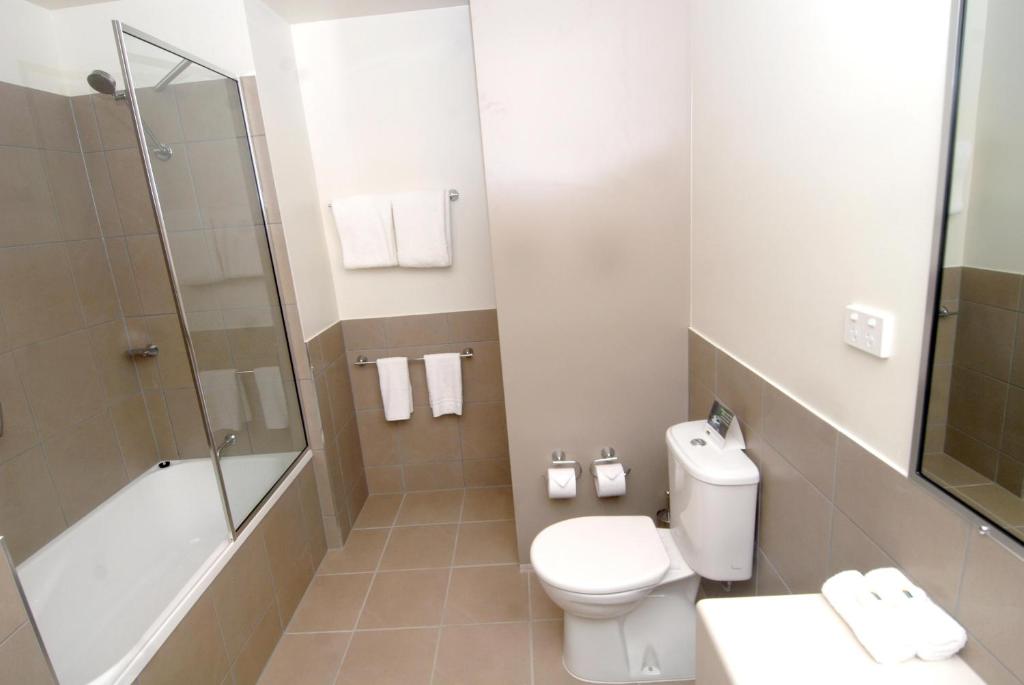 Koupelna v ubytování Gladstone Downtown Central Apartment Hotel Official