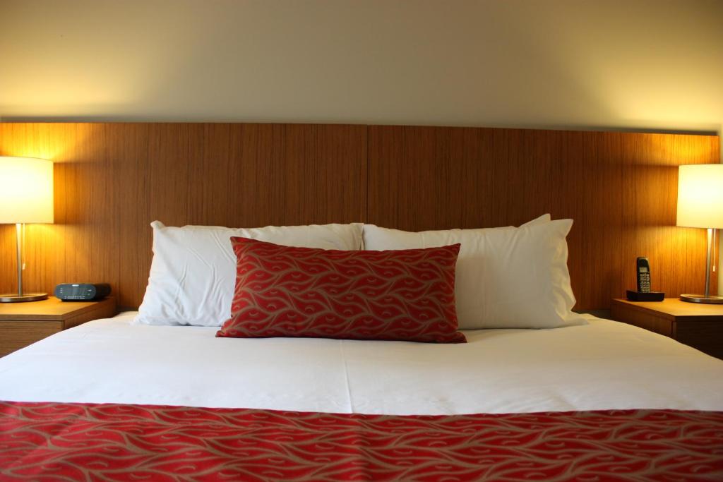 Postel nebo postele na pokoji v ubytování Gladstone Downtown Central Apartment Hotel Official