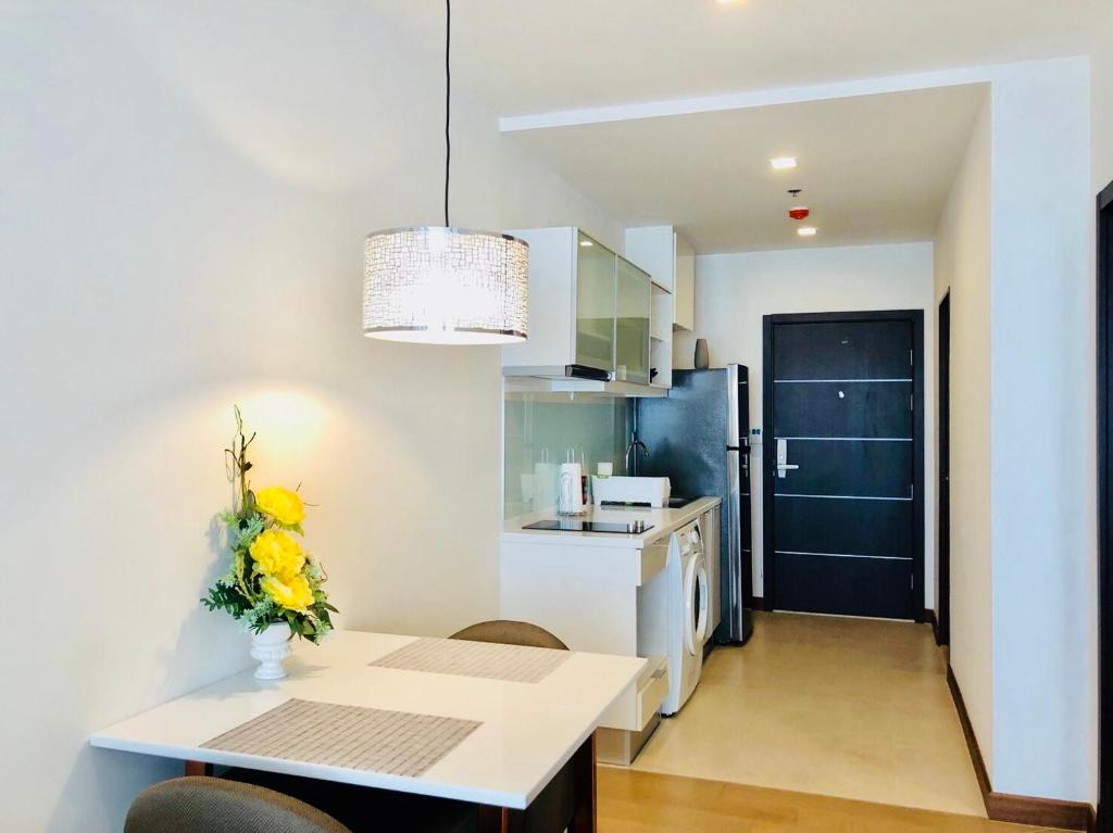 Kuchyň nebo kuchyňský kout v ubytování Astra Suites Central