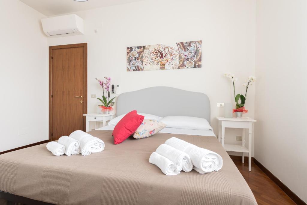 Postel nebo postele na pokoji v ubytování Ellebì B&B