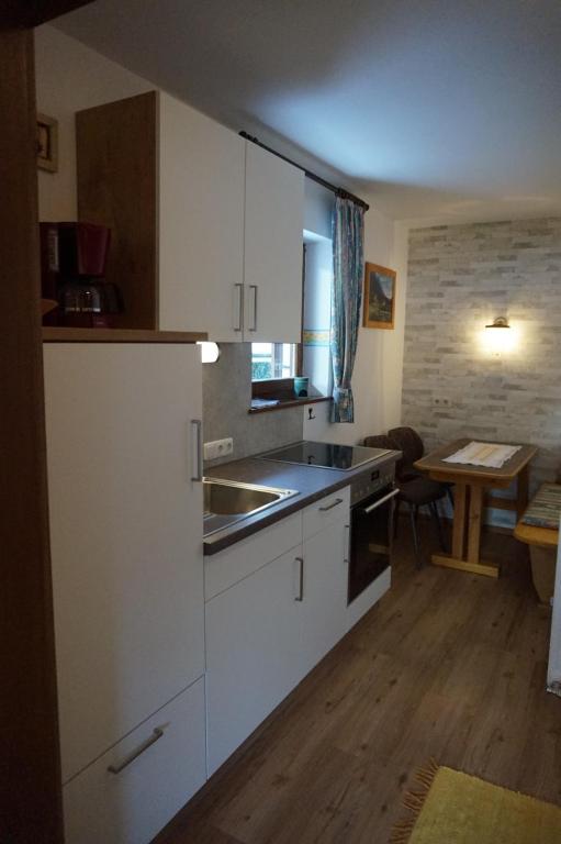Kuchyň nebo kuchyňský kout v ubytování Haus Rosenegg