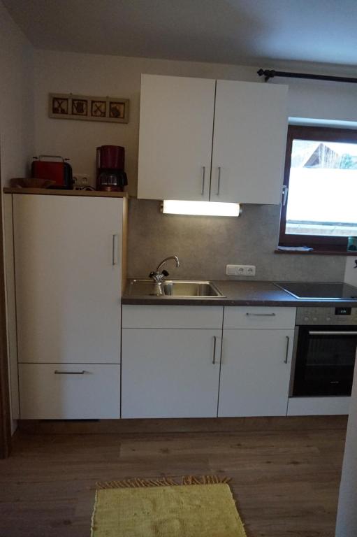 Kuchyň nebo kuchyňský kout v ubytování Haus Rosenegg