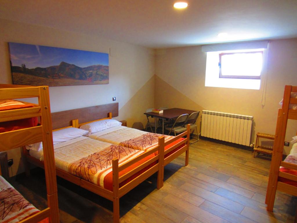Postel nebo postele na pokoji v ubytování Matxitxulo Family Rooms