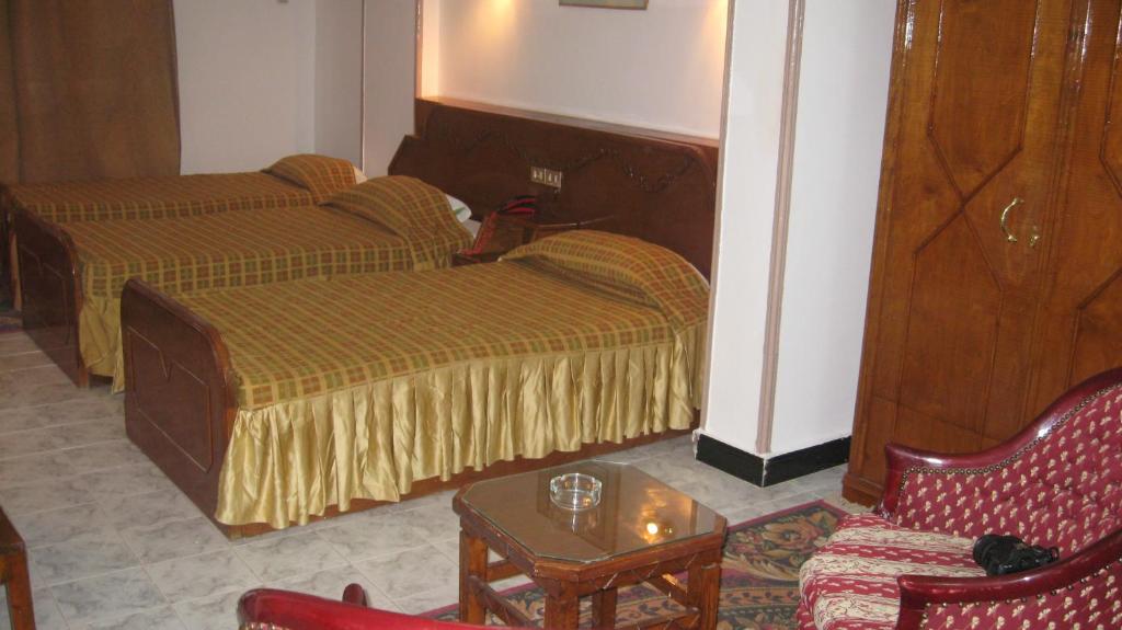 Postel nebo postele na pokoji v ubytování Sara Hotel Aswan