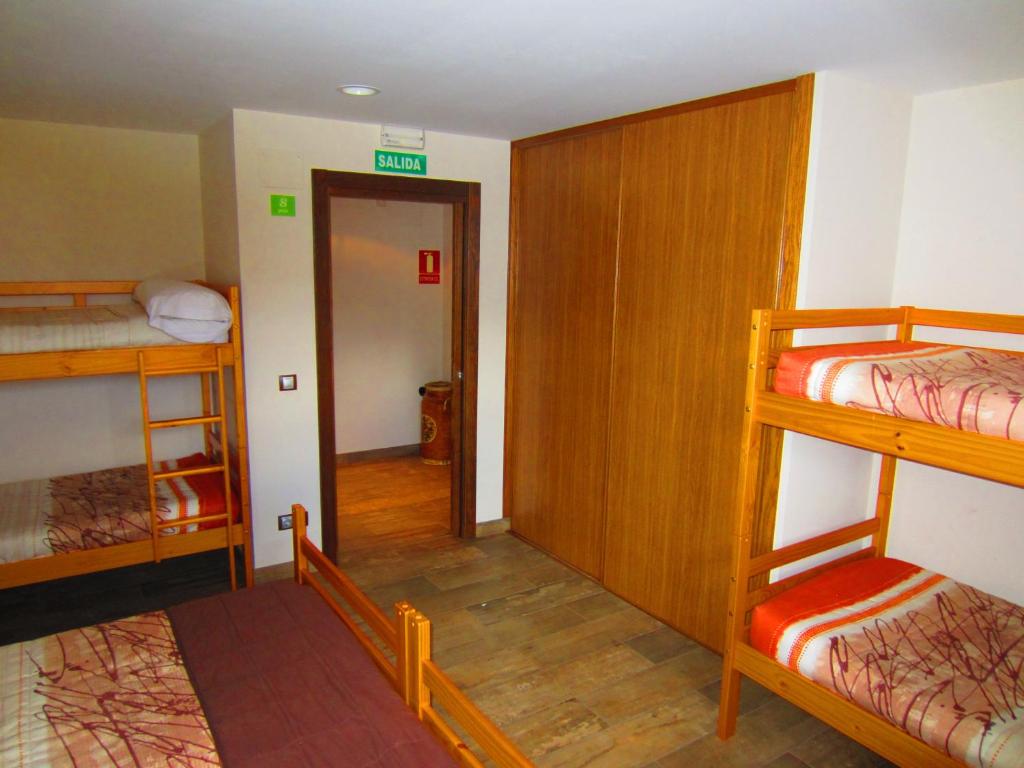 Postel nebo postele na pokoji v ubytování Matxitxulo Family Rooms