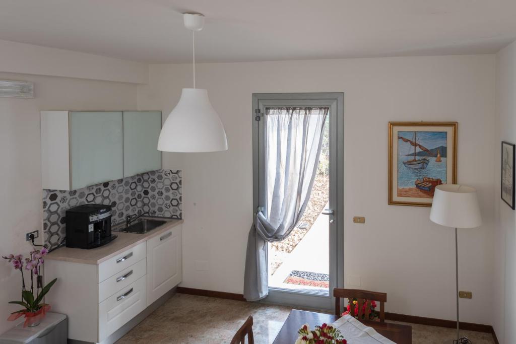 Kuchyň nebo kuchyňský kout v ubytování Ellebì B&B