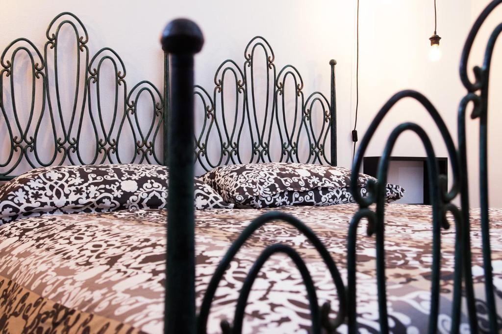 Posteľ alebo postele v izbe v ubytovaní B&B Miseno23
