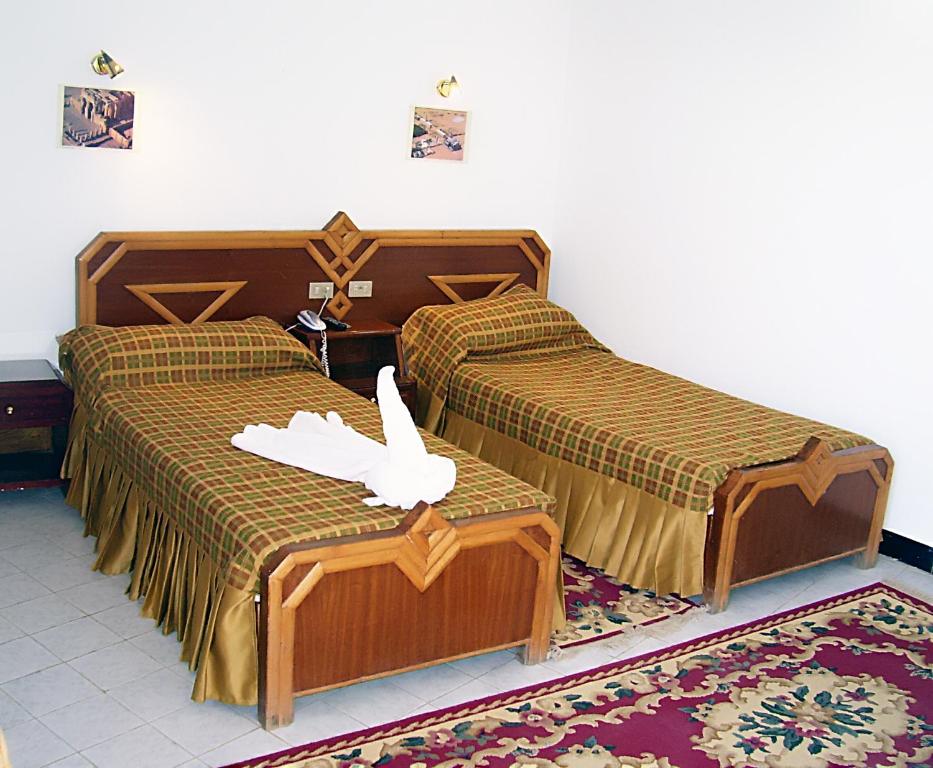 Postel nebo postele na pokoji v ubytování Sara Hotel Aswan
