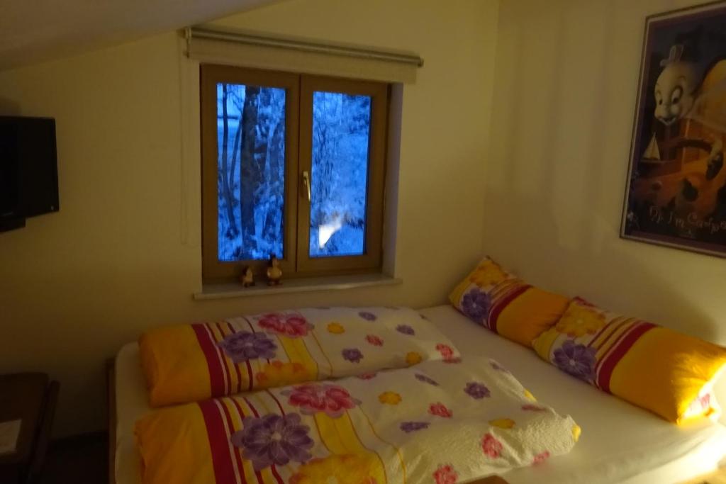 Postel nebo postele na pokoji v ubytování Zum Alten Forsthaus