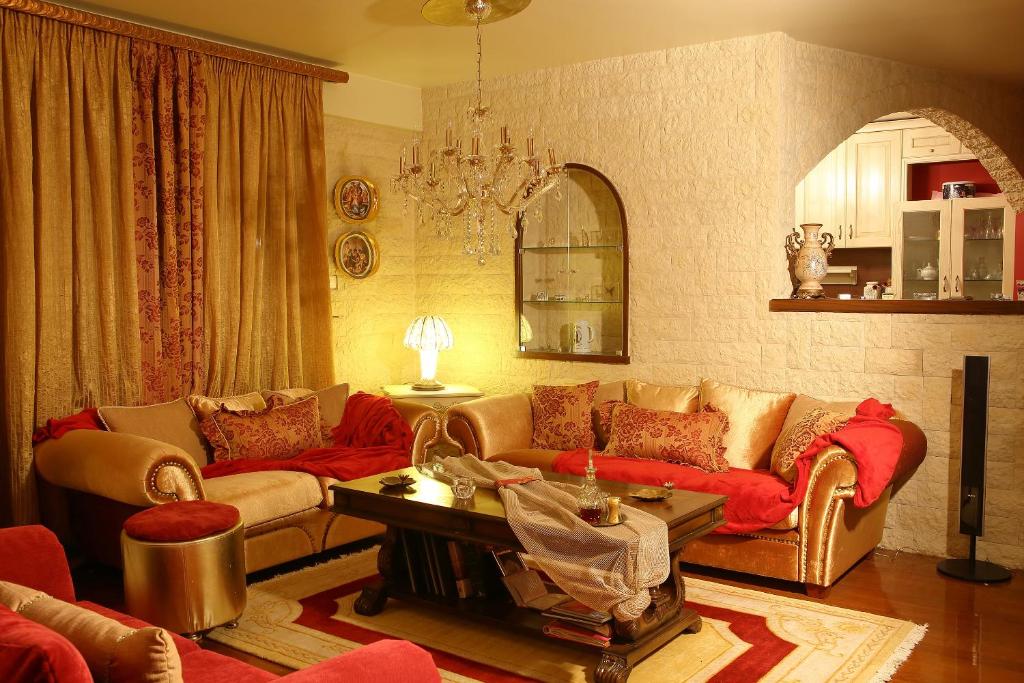 A seating area at Villa Deluxe Sight