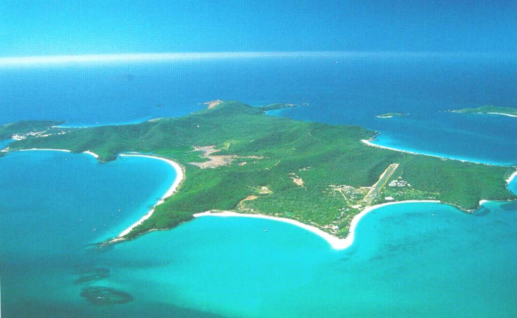 an aerial view of an island in the ocean at Great Keppel Island Holiday Village in Great Keppel