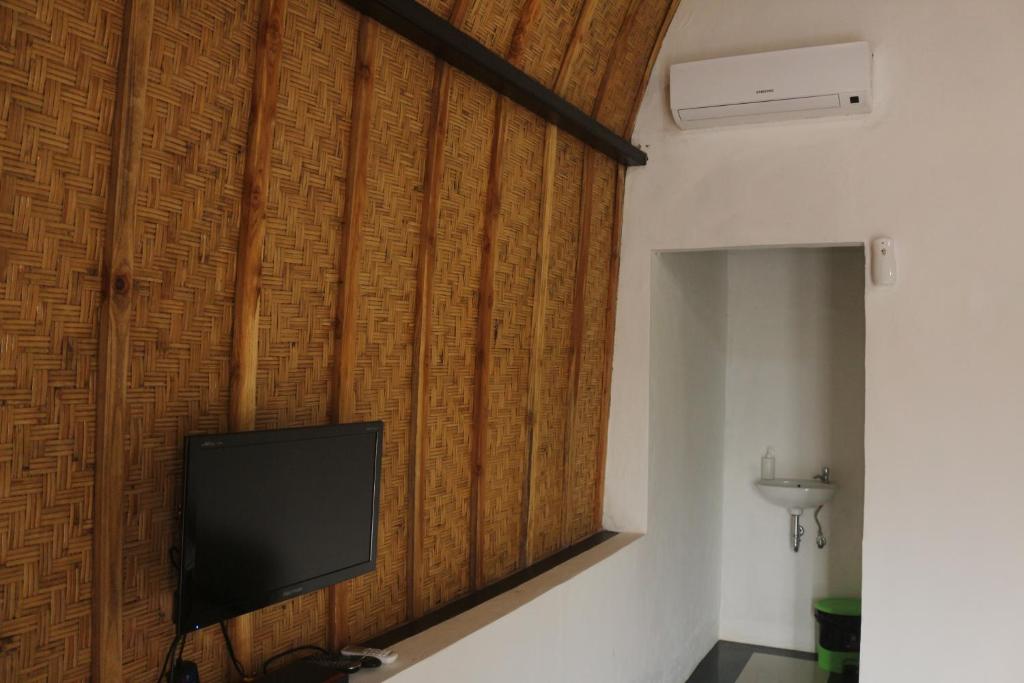 TV a/nebo společenská místnost v ubytování Sebrang Hills Bungalow