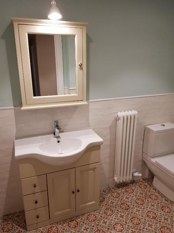Kúpeľňa v ubytovaní Casa Raval De Gracia C