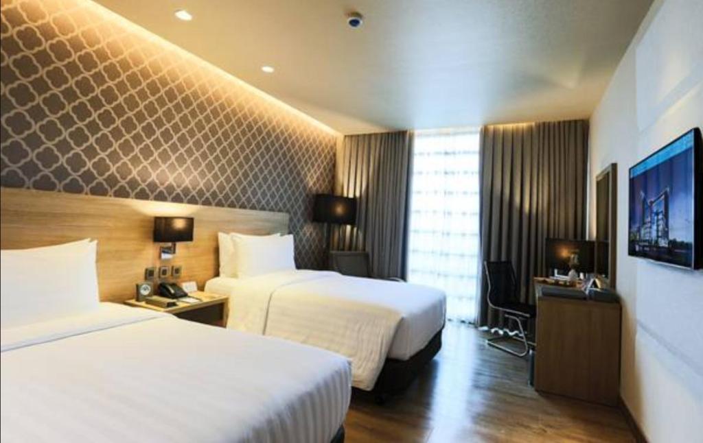 bai Hotel Cebuにあるベッド
