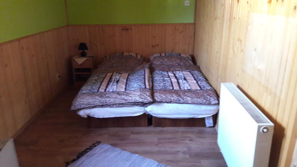 Postel nebo postele na pokoji v ubytování Chalupa JANINA