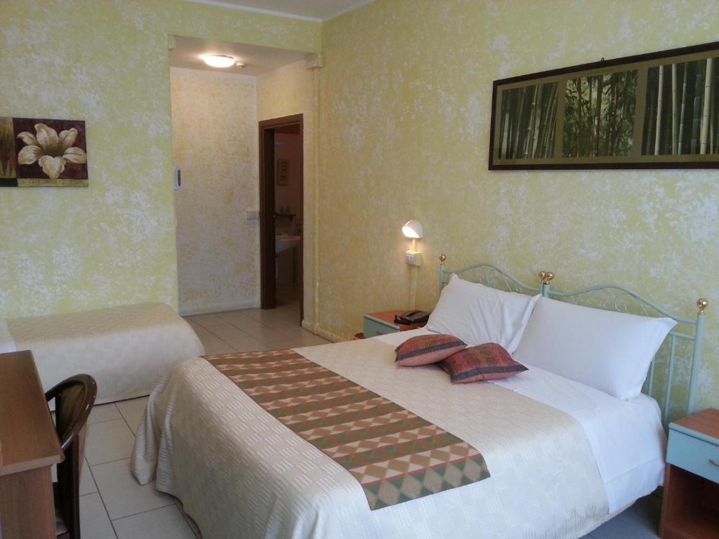 Postel nebo postele na pokoji v ubytování Park Hotel