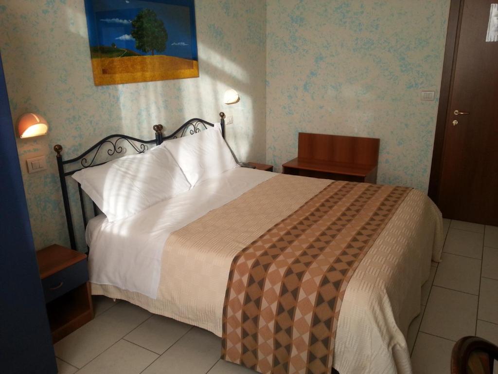 Postel nebo postele na pokoji v ubytování Park Hotel