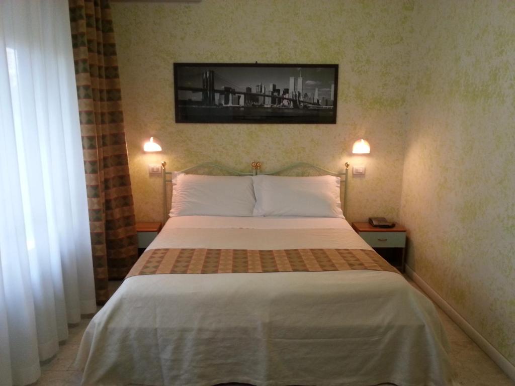 Postel nebo postele na pokoji v ubytování Park Hotel