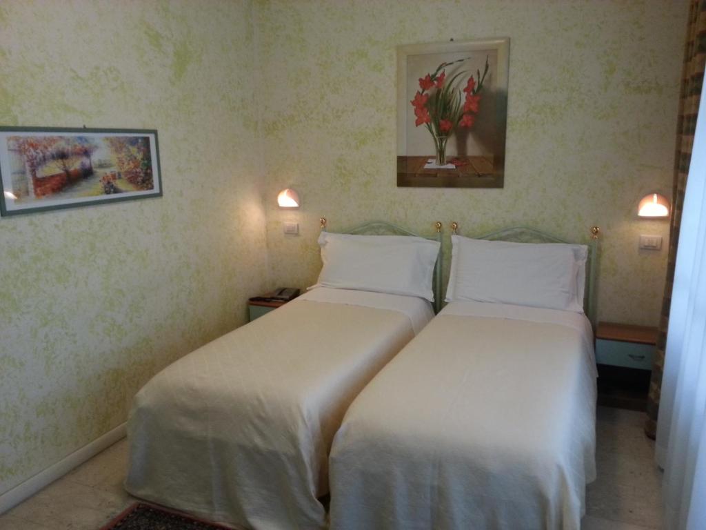 Postel nebo postele na pokoji v ubytování Park Hotel