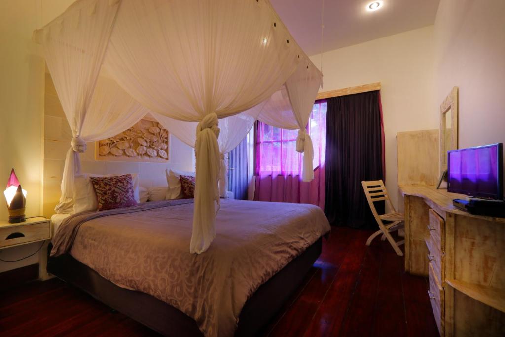 Postel nebo postele na pokoji v ubytování Pearl Boutique Hotel Adult only