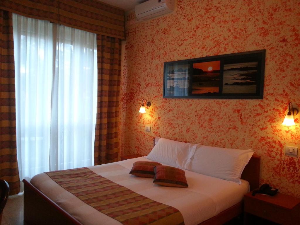 Postel nebo postele na pokoji v ubytování Park Hotel