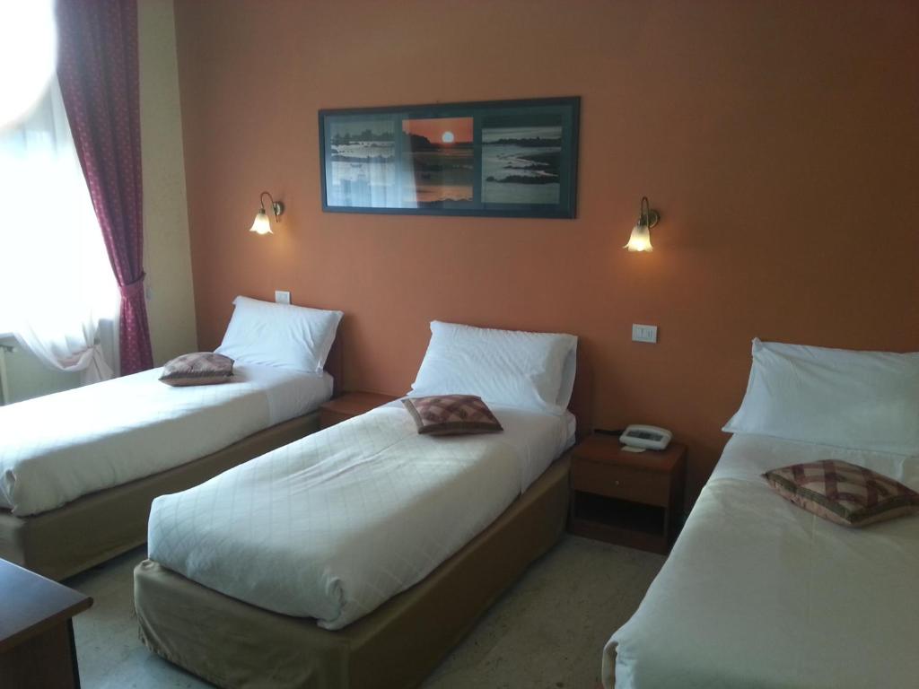Postel nebo postele na pokoji v ubytování Park Hotel
