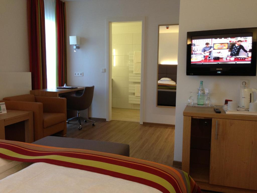 TV a/nebo společenská místnost v ubytování Hotel Wieting