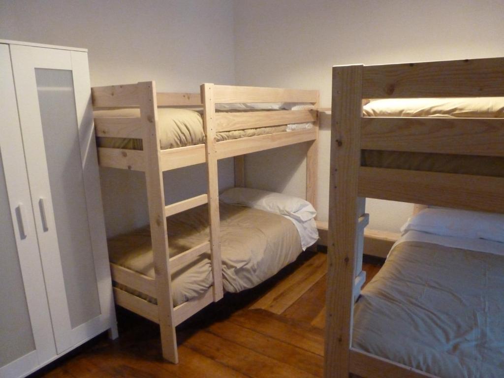 Postel nebo postele na pokoji v ubytování Hostal del Arquitecto