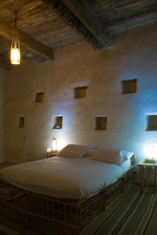 Rúm í herbergi á Albabenshal Lodge Siwa