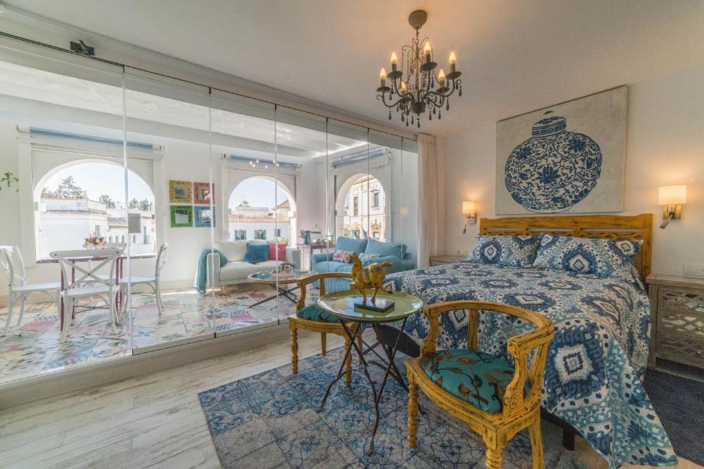 Postel nebo postele na pokoji v ubytování Rey Don Pedro Luxury Home