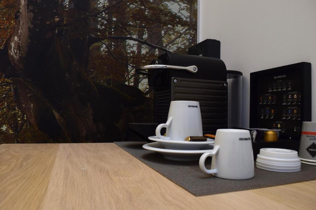 Příslušenství pro přípravu čaje a kávy v ubytování Zerupe Hotel