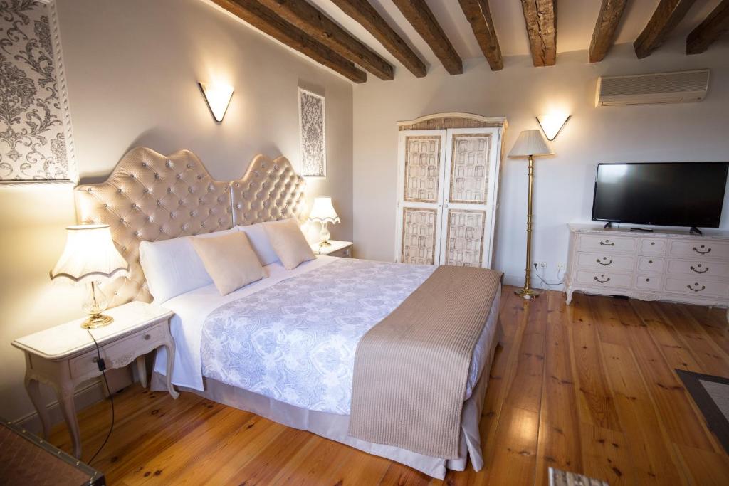 Postel nebo postele na pokoji v ubytování Hostal Central Palace Madrid