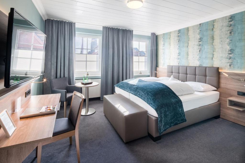 Ένα ή περισσότερα κρεβάτια σε δωμάτιο στο Hotel zur Post NEW STYLE