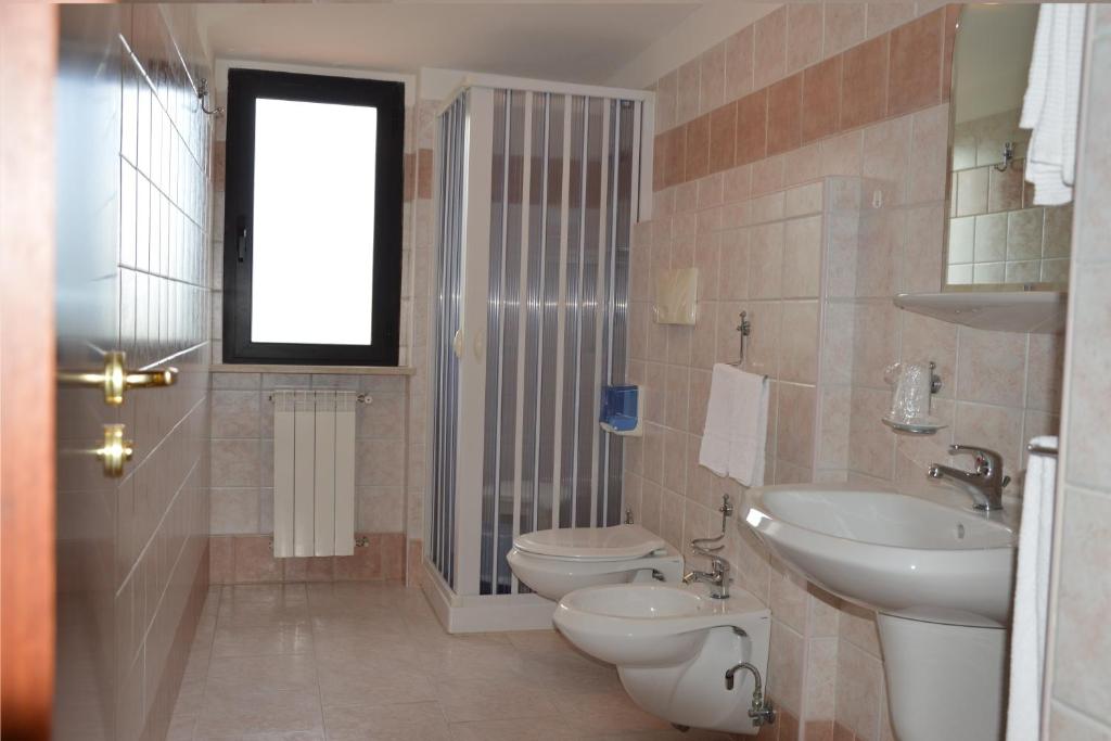 Koupelna v ubytování Hotel Rosamarina