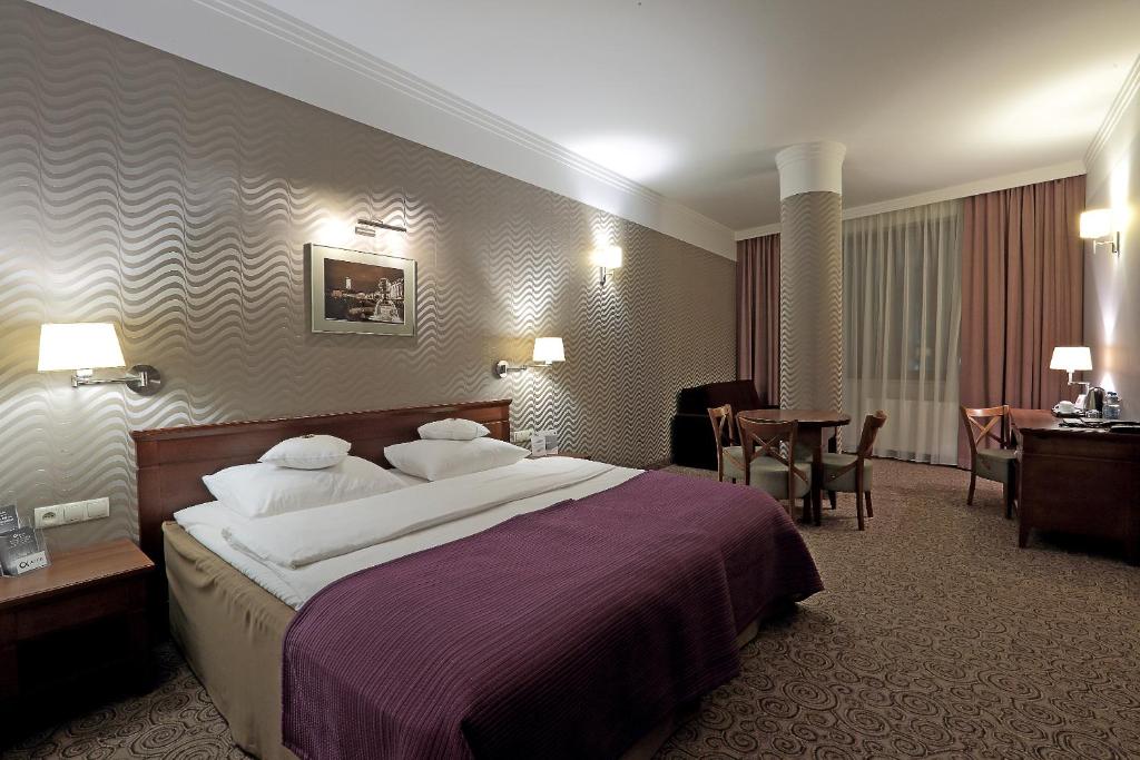 Postel nebo postele na pokoji v ubytování Hotel Esperanto
