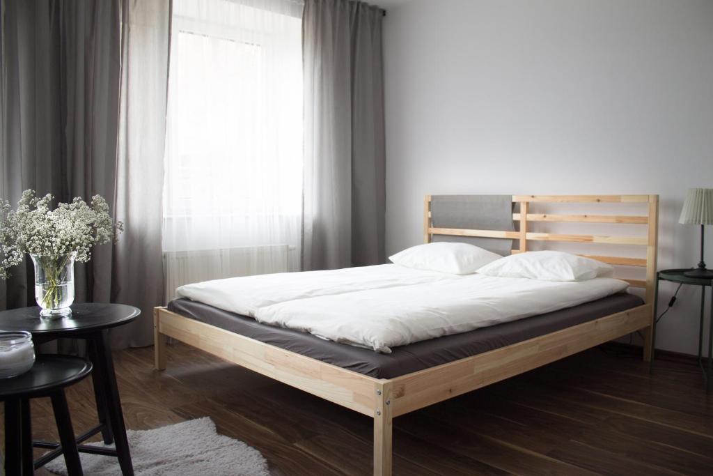 Een bed of bedden in een kamer bij Agroturystyka Święty Spokój